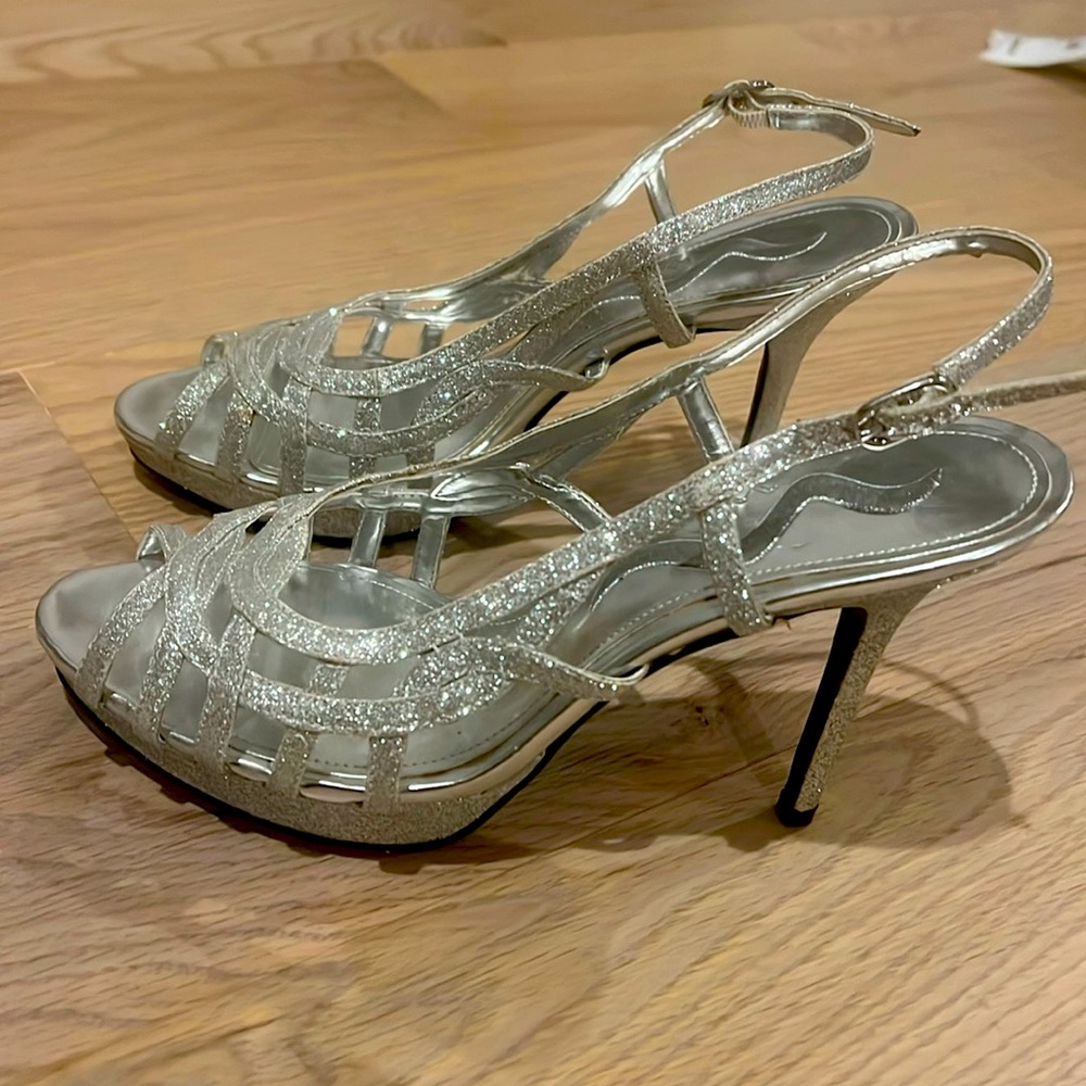 Nina size 7.5 silver glitter 3 inch heels. Worn for 2 hours only!